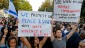 Demonstrators hold pro-Israel placards during a gathering in front of the Israeli Embassy in Paris, France, Thursday, July 31, 2014. (AP Photo/Francois Mori)